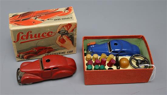 A Schuco Telesteering Car 3000 with instructions and box and another with incomplete accessories Schuco 3000 length 10cm